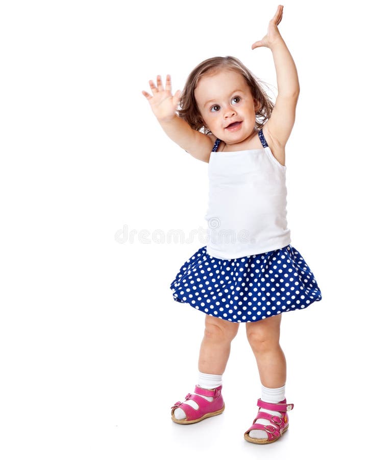 A little girl is posing