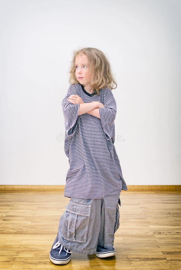 Little Girl Posing Oversized Shorts Stock Photos Free & RoyaltyFree
