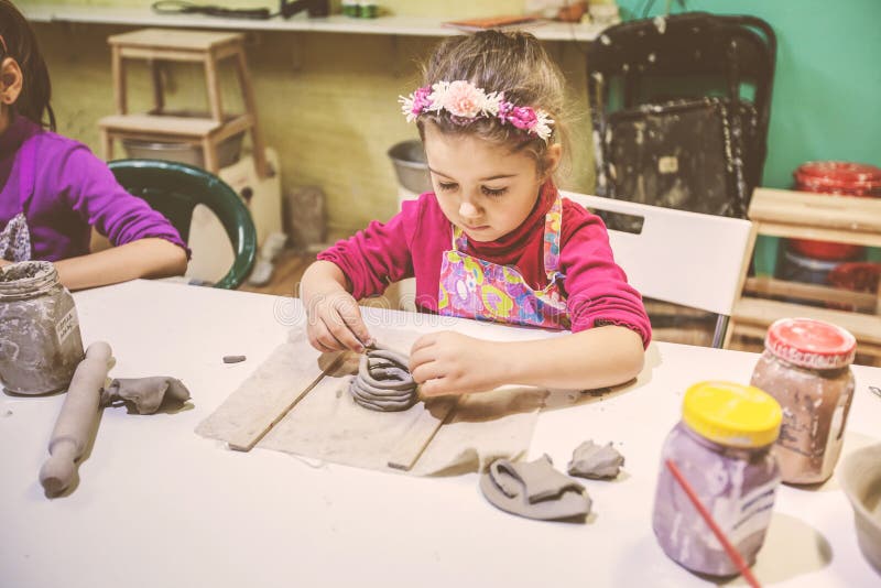 Little Girl at Pottery Working with Clay Stock Image Image