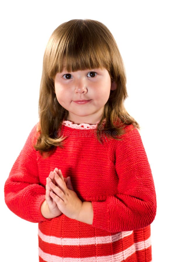 Awesome casual little girl wearing red dress praying for... isolated on white. Awesome casual little girl wearing red dress praying for... isolated on white
