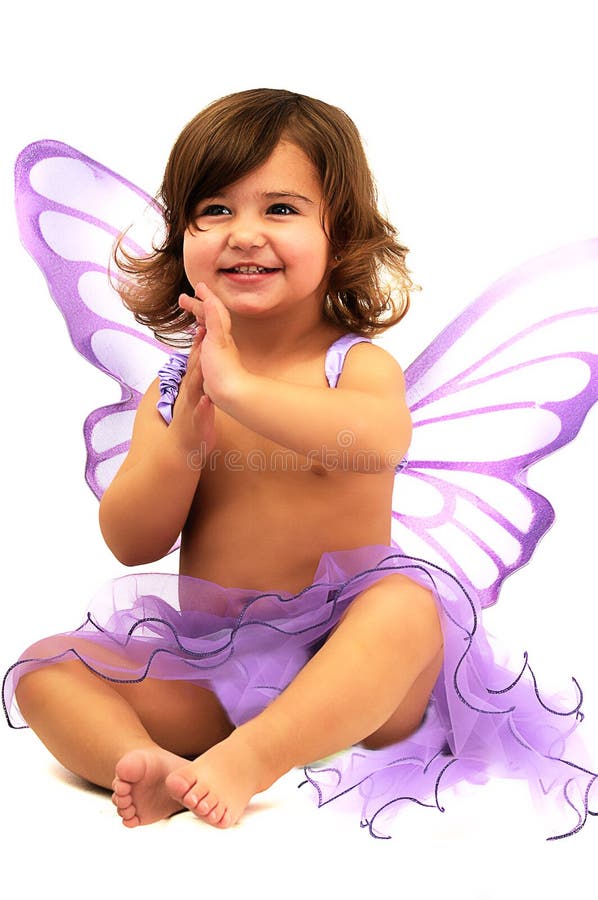 Little girl with purple angle wings sitting and sm
