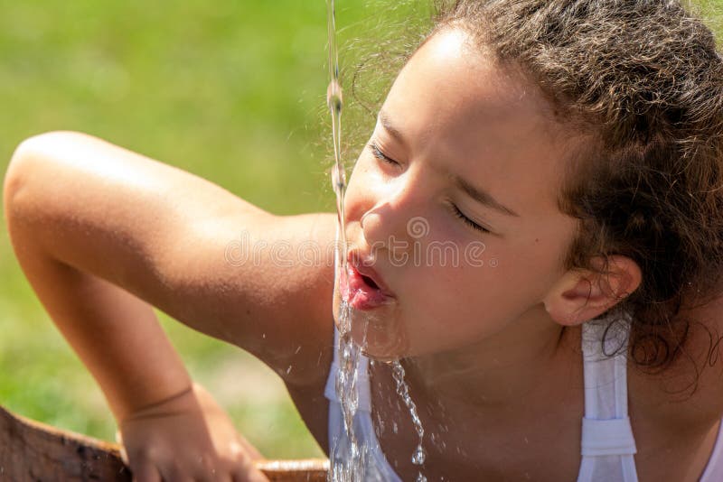 little girl quenching herself