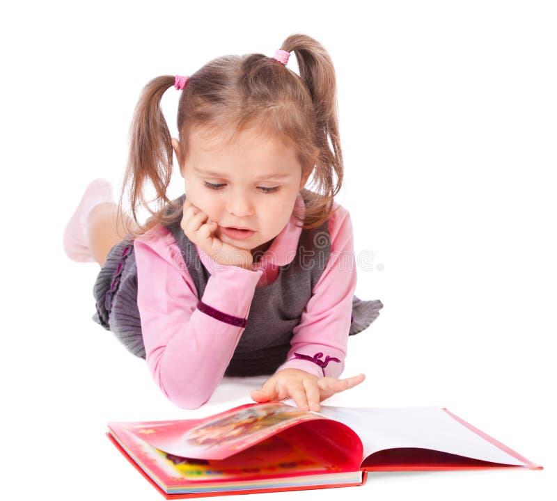 Little girl reading a book