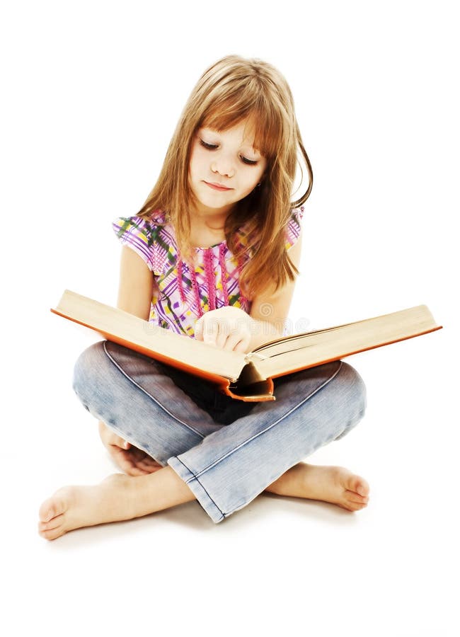 A Little Girl Reading a Book on the Floor Stock Photo - Image of learn ...