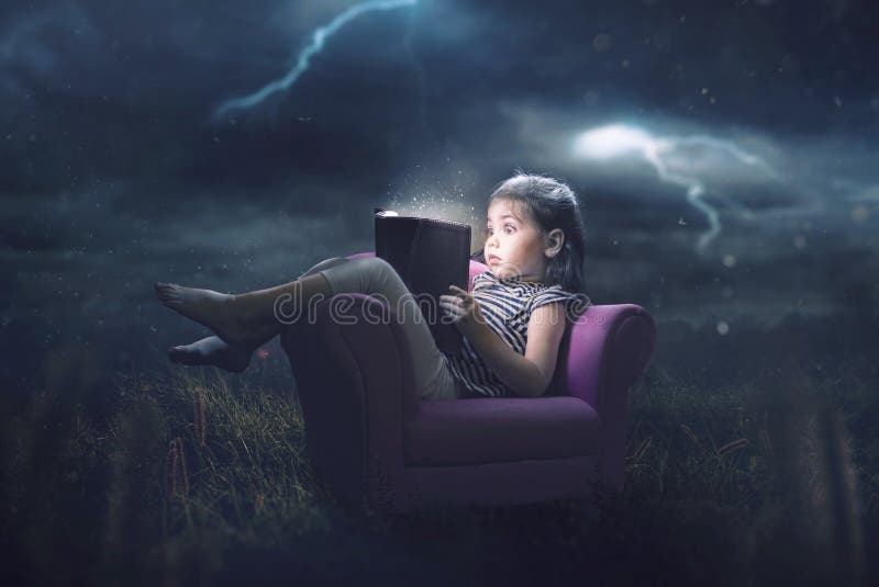 Little girl reading in storm royalty free stock image Little girl reading in storm royalty free stock image