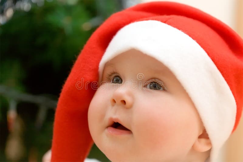 Little girl in red Santa hat