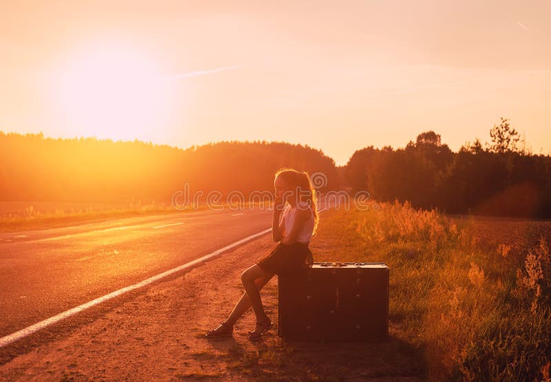 Little Girl relaxing and enjoying road trip.