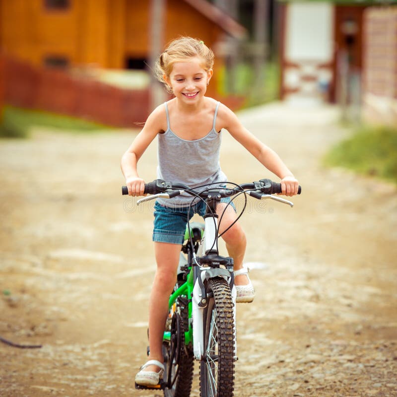 Little girl riding a bicycle