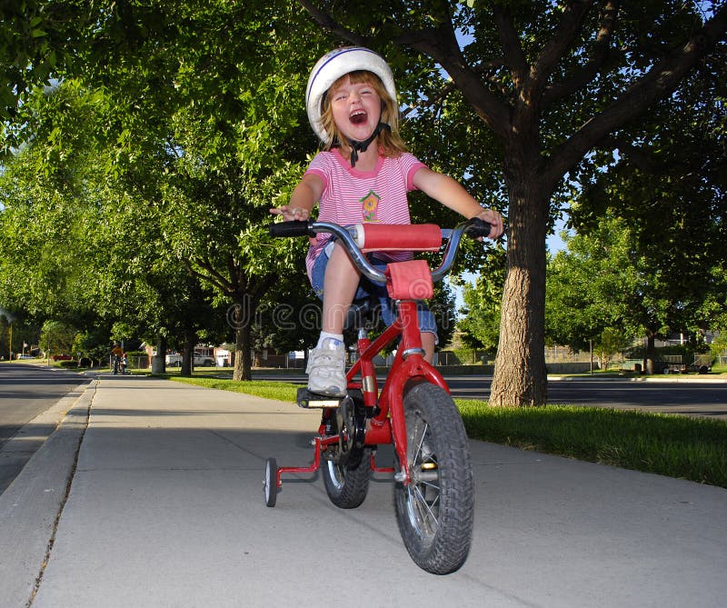 Little Girl Riding a Bike