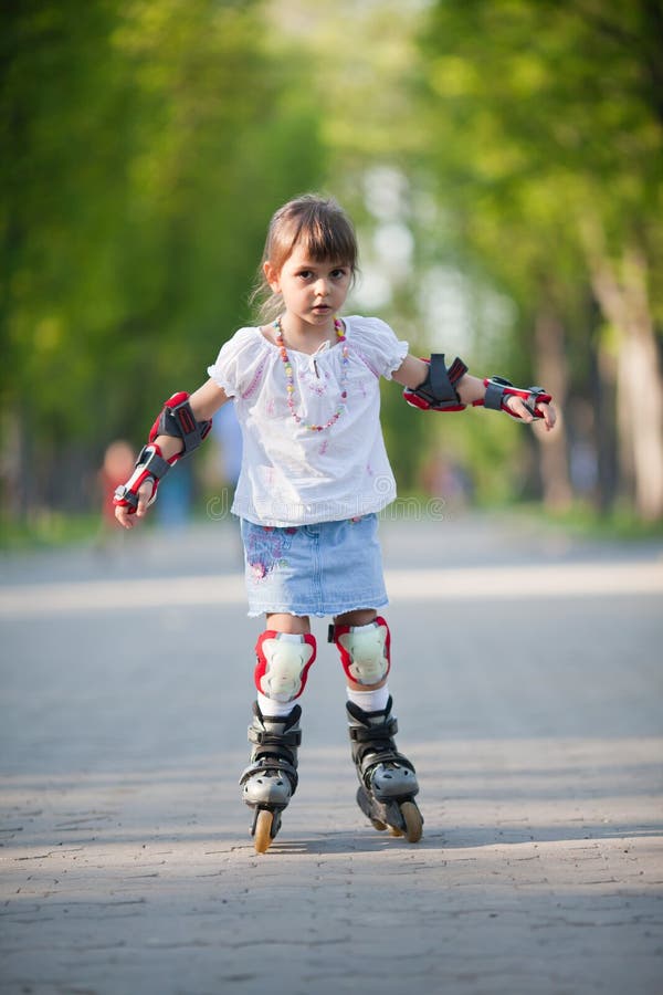 Little Adorable Girl Roller Skating Park Stock Photos Free & RoyaltyFree Stock Photos from