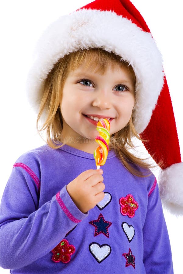 Little Girl in Santa Claus Hat with Candy Stock Image Image of