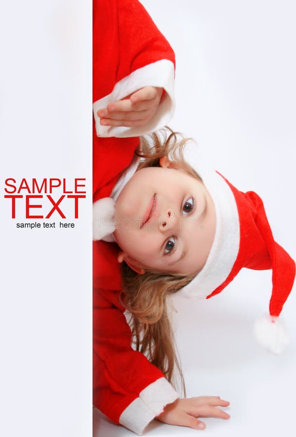 Little girl in Santa's hat stock photography Little girl in Santa's hat stock photography