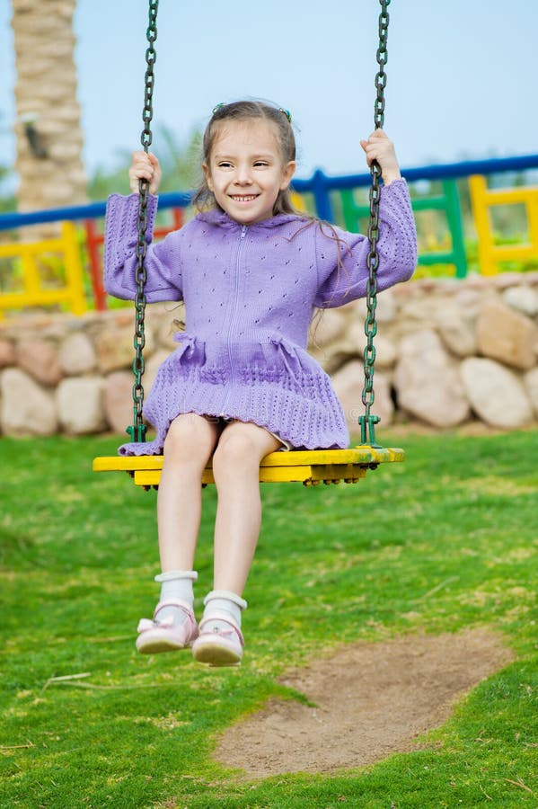 Little Girl Sits On Swing Stock Photo Image 23902290