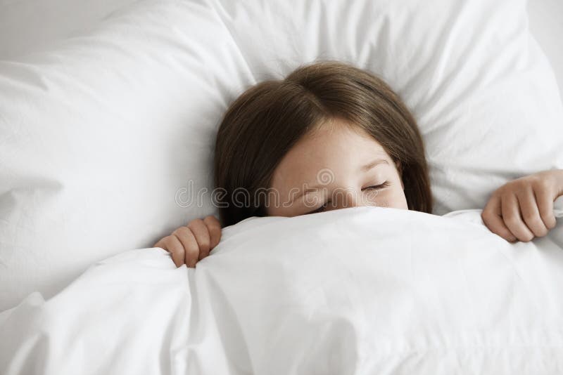 Little Girl Sleeping In Bed