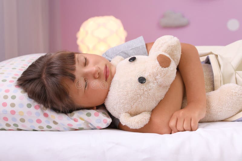 Little Girl Sleeping with Teddy Bear in Bed Stock Image Image of