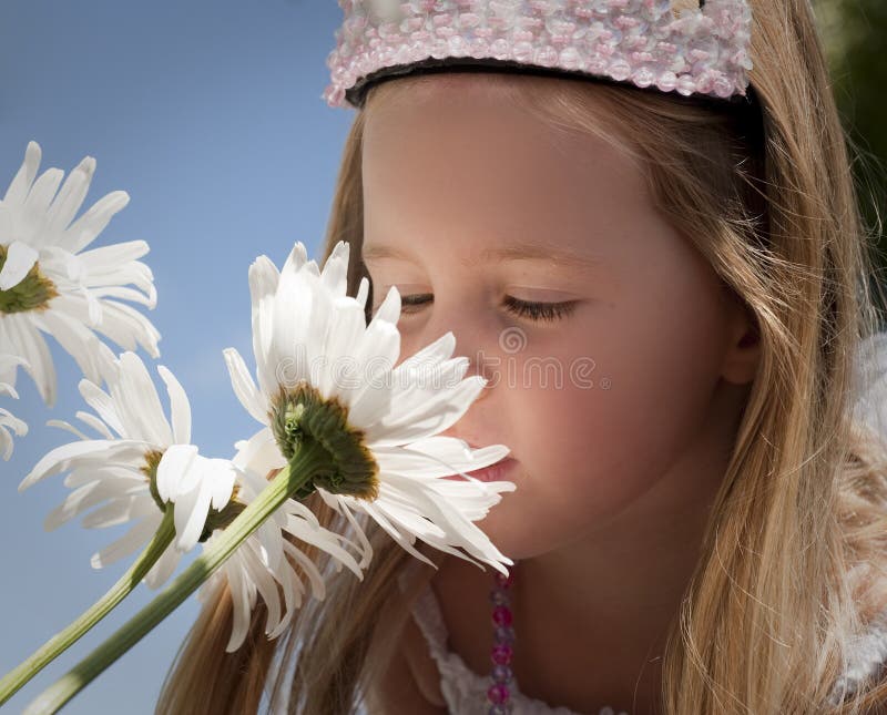 Little Girl Smelling Flowers Stock Photo Image 18732062