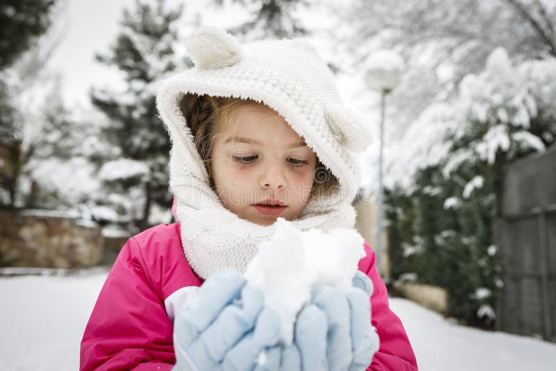 Little girl in snow stock photo. Image of beautiful 207383144