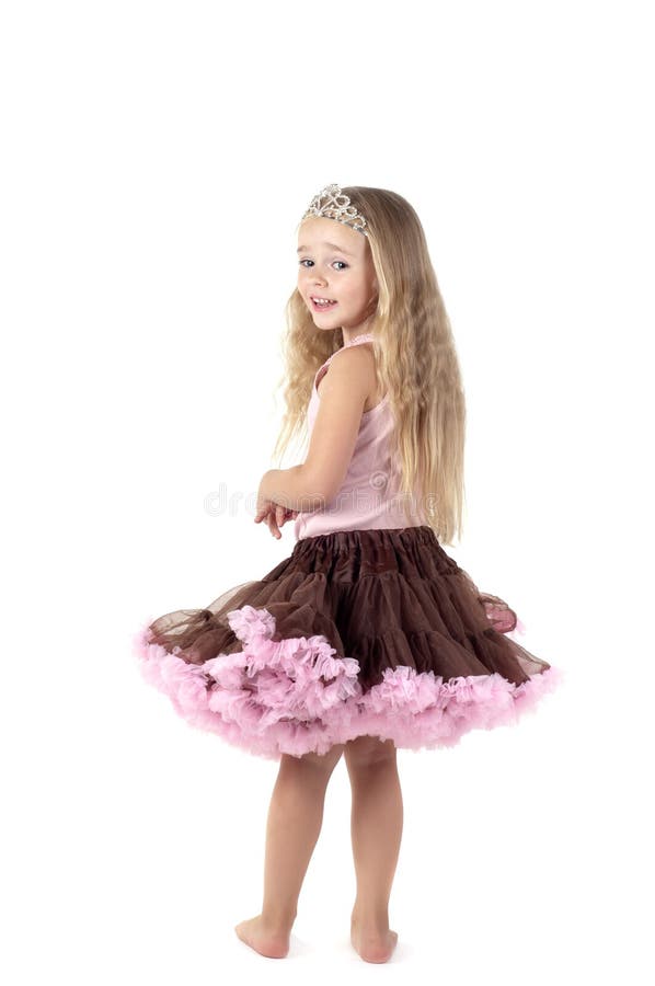 Little girl in studio in skirt stock images