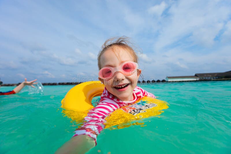 Little girl swimming stock photo. Image of holiday, recreational - 44025808