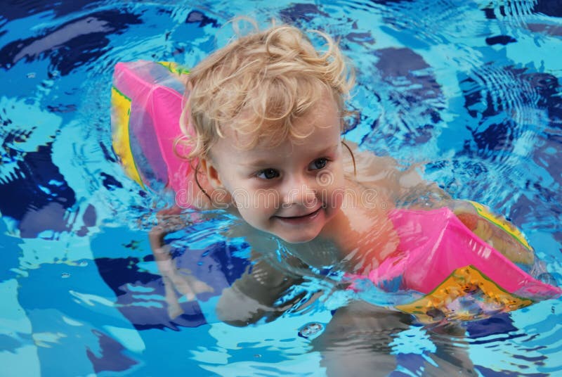 Little Girl In Swimming Pool Stock Photo - Image of dive 