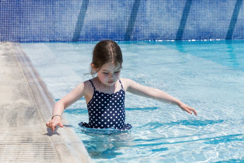 Little Girl Swimming in a Pool Stock Image Image of beautiful