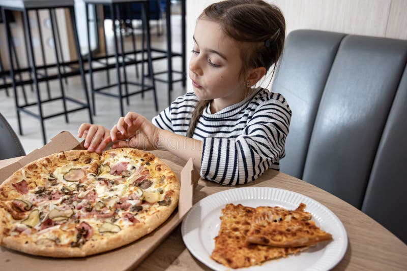 The Little Girl Takes a Slice of Delicious Pizza Stock Image - Image of ...