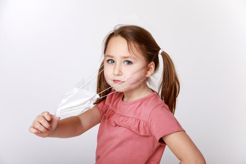 Girl with a mask from covid