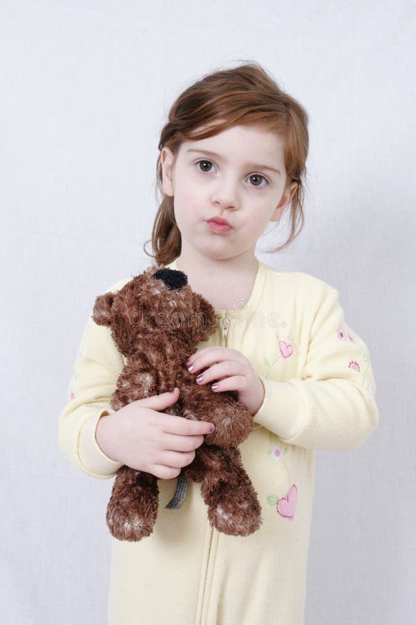 little girl with a teddy bear
