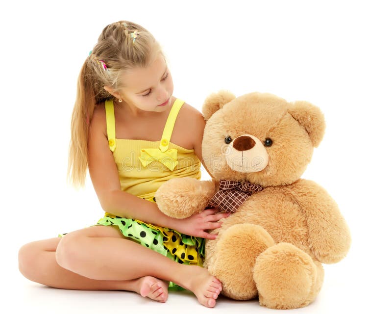 Little girl with teddy bear