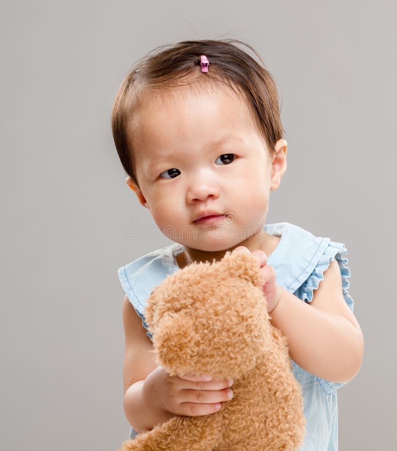 Asian Little Chinese Girl With Teddy Bear Stock Photo - Image of glad, home: 67835306