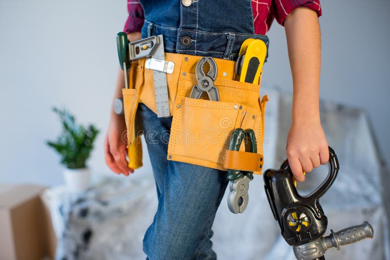 Little girl in tool belt stock photo. Image of builder 90730664