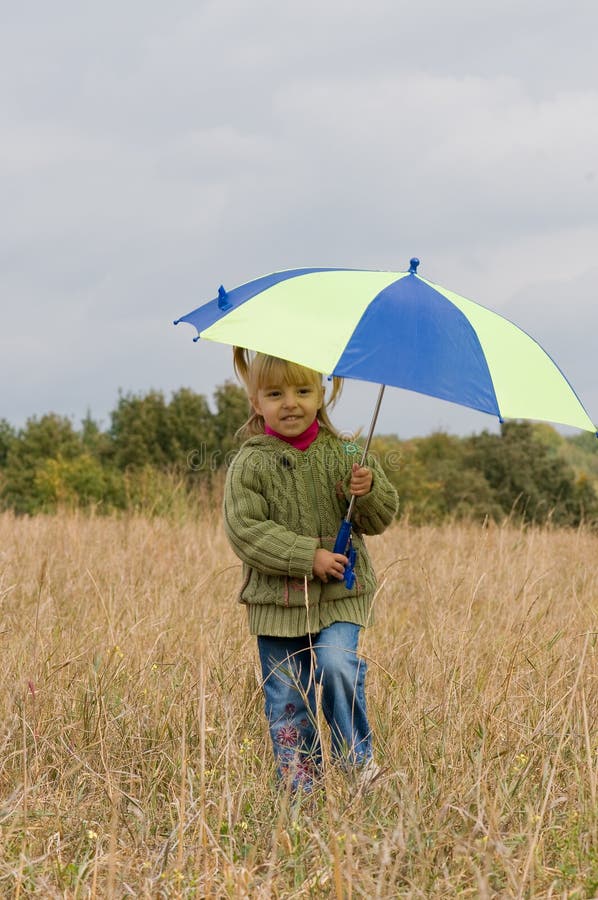 Little girl with umbrella