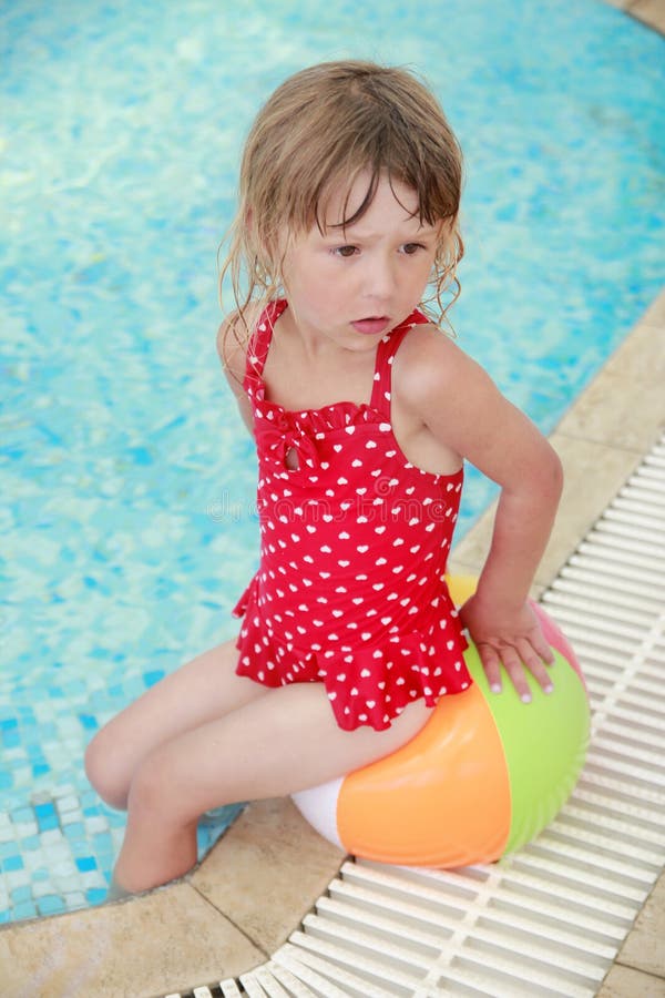 Little Girl Lying beside the Pool Stock Image - Image of nature, games:  37466907