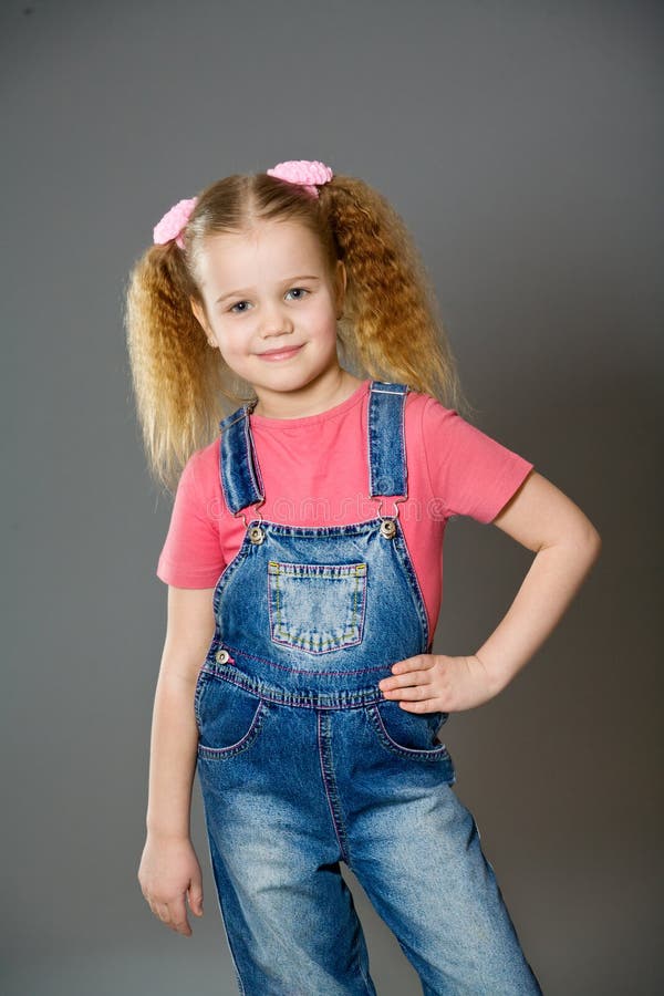 3,591 Little Girl Wearing Jeans Stock Photos - Free & Royalty-Free Stock  Photos from Dreamstime