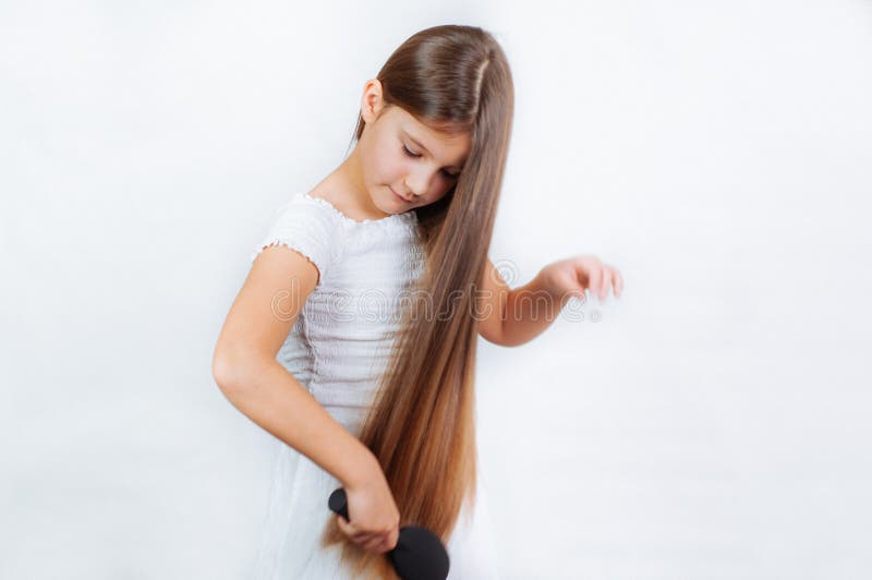 Cute Smiling Little Girl Combing Her Hair Comb Makes Hair Stock Image -  Image of background, child: 168401213