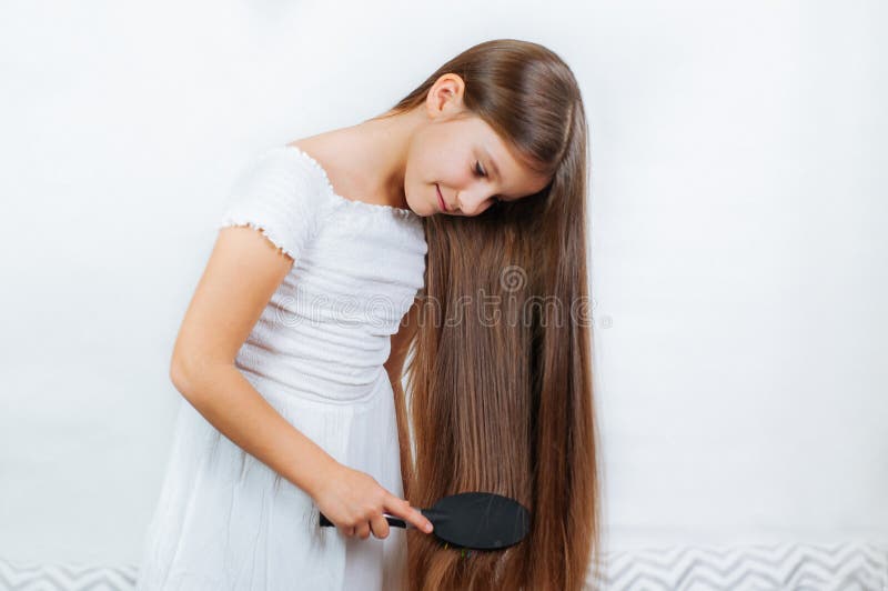 Cute Smiling Little Girl Combing Her Hair Comb Makes Hair Stock Photo - Image of conditioner, haircut: 168401218 Cute Smiling Little Girl Combing Her Hair Comb Makes Hair Stock Photo - Image of conditioner, haircut: 168401218