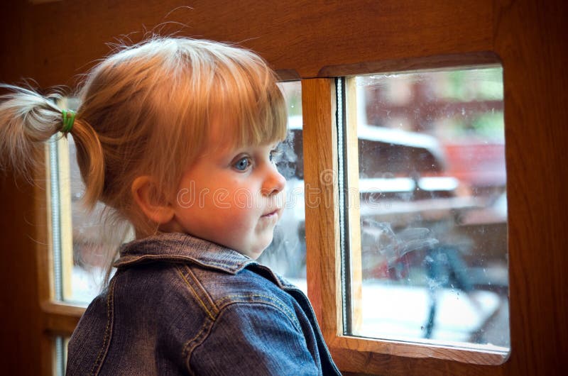 Little girl at window