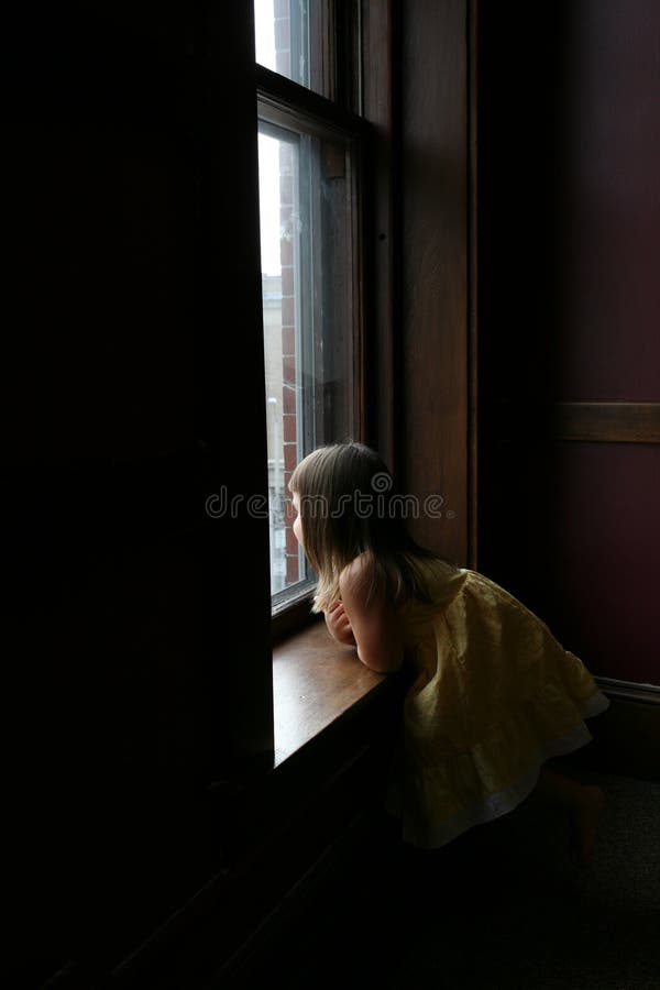 Little girl in window