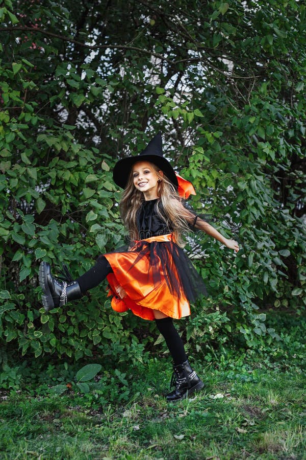 Little Girl in Witch Costume on Halloween Trick or Treat Outdoor Stock ...