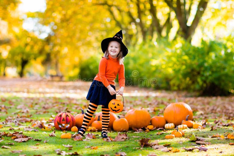 Little Girl in Witch Costume on Halloween Trick or Treat Stock Photo ...