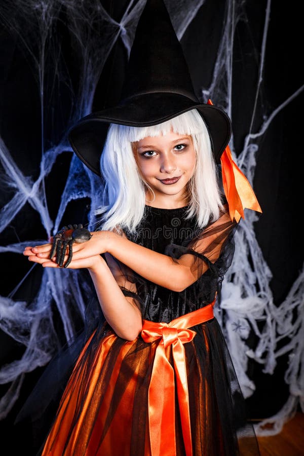 Little Girl in Witch Halloween Costume Having Fun . Little Witch Stock ...