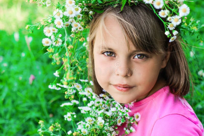 Little Girl with a Wreath of Flowers on Her Head Stock Photo - Image of ...