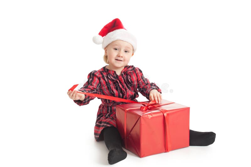 Little girl with xmas gift stock photo