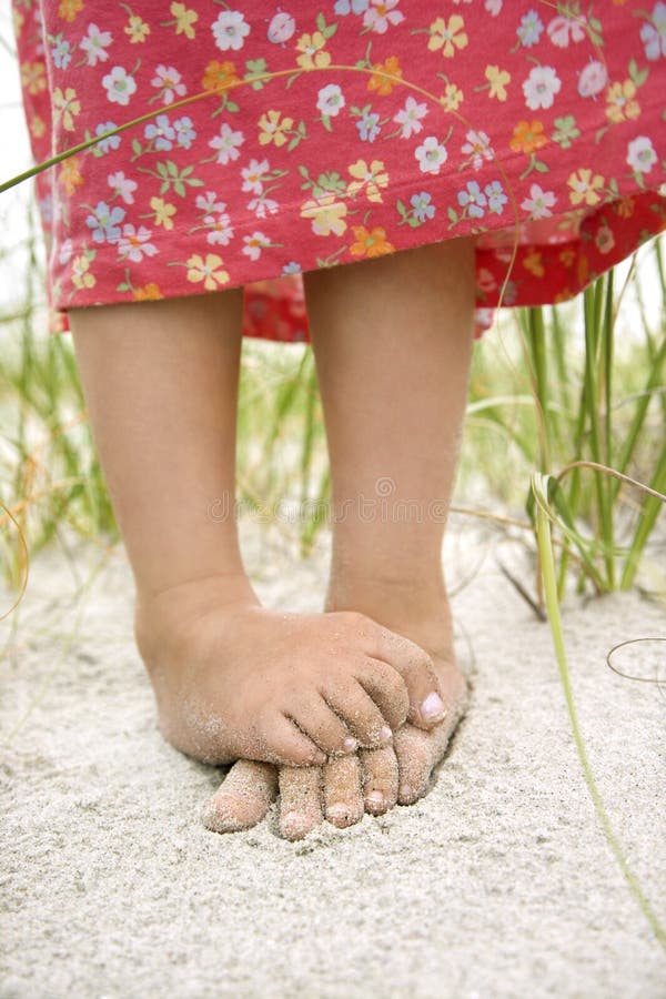 Little Girls Feet in the Sand