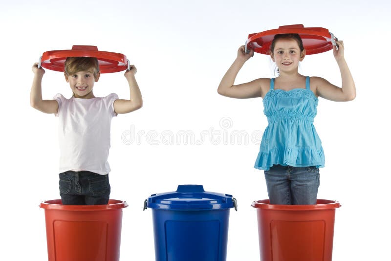 Little girls in a plastic drums