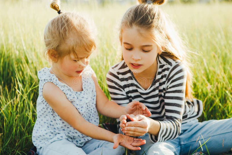 little-girls-studying-world-insects-green-grass-field-summer-holidays-little-girls-looking-124336177.jpg little-girls-studying-world-insects-green-grass-field-summer-holidays-little-girls-looking-124336177.jpg