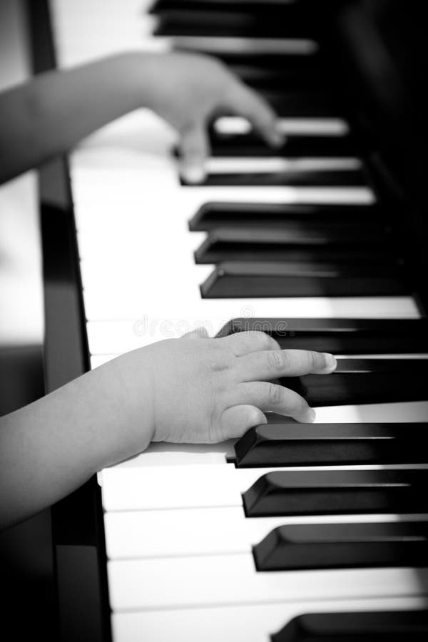 Little Hands Playing on the Piano Stock Image Image of kids, keys