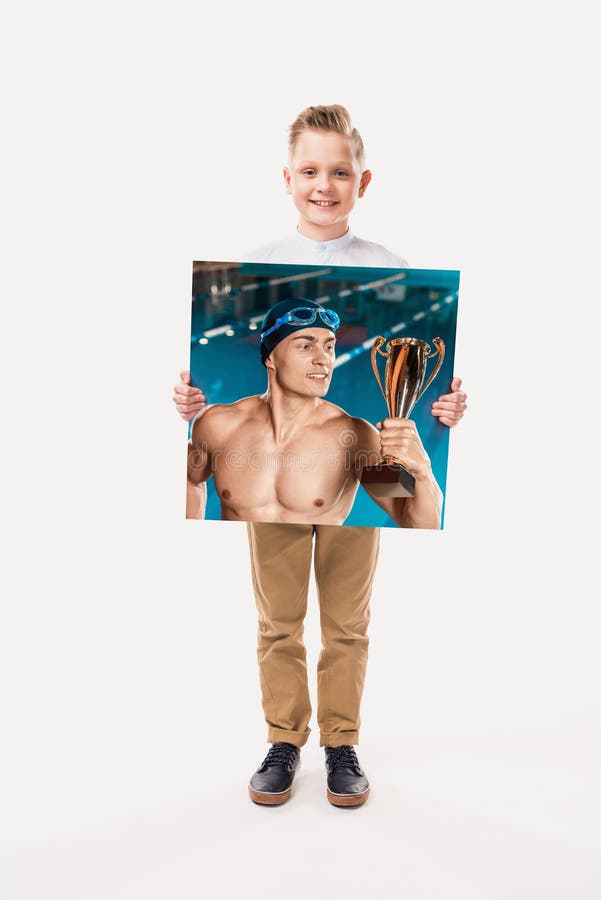 Little happy boy pretending to win in swimming competition royalty free stock images