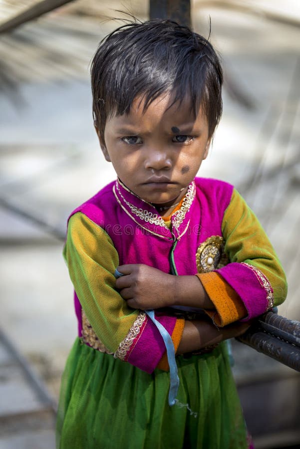 Little Indian Girl Stand Alone beside Makeshift Walkway of Construction ...