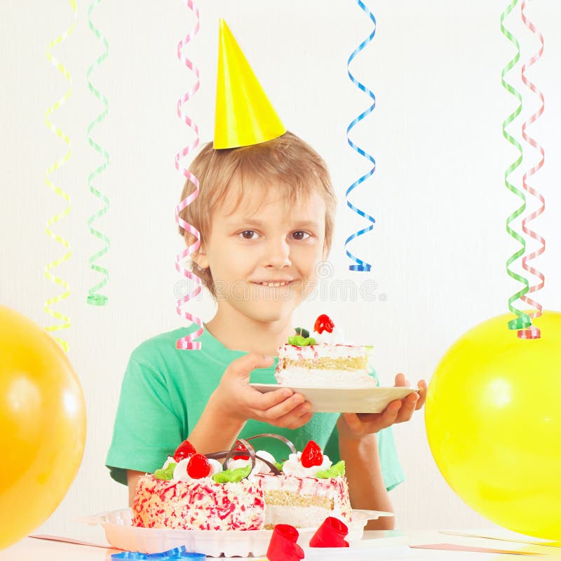 Little Kid in Holiday Hat with Piece of Birthday Cake and Balloons ...